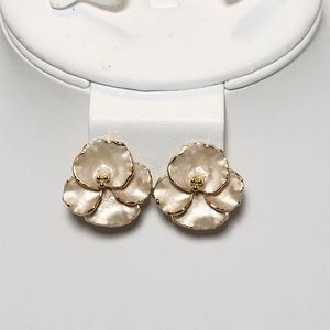 VINTAGE Creamy Baked Enamel Flower Goldtone Clip-On Earrings